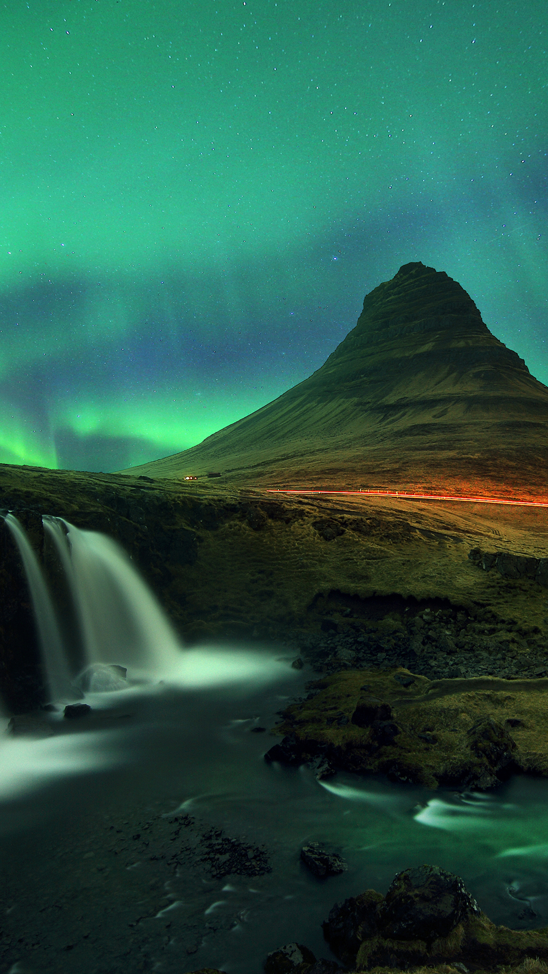 Waterfall beside a hill